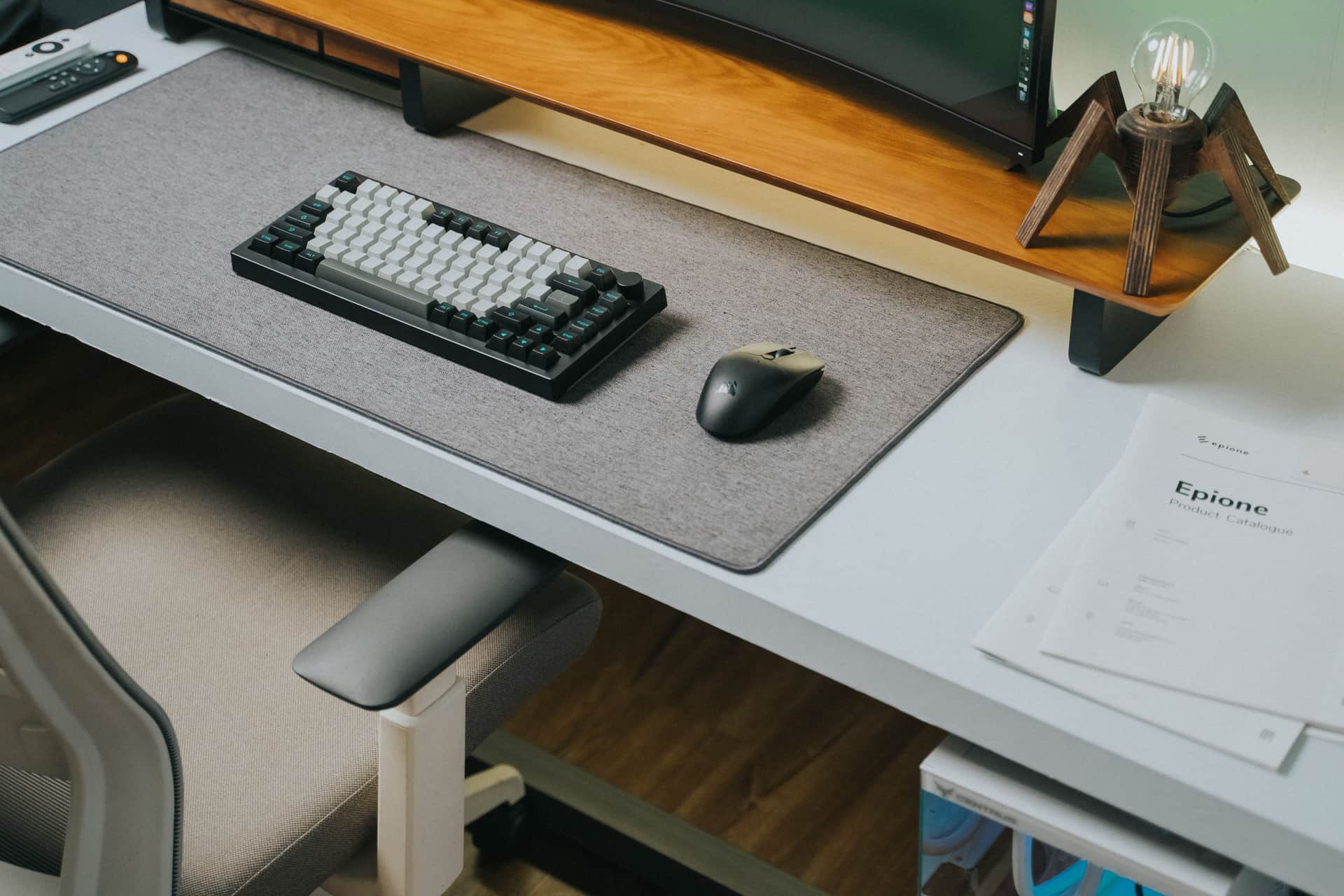 An anti-fatigue mat, a footrest, a lumbar cushion and a seat cushion around a desk